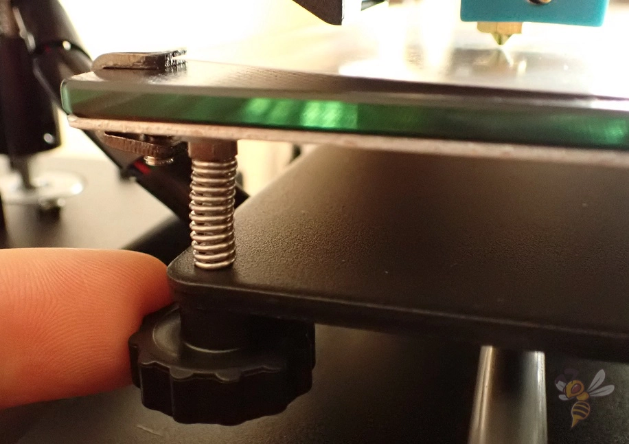 Print bed leveling with the paper method.