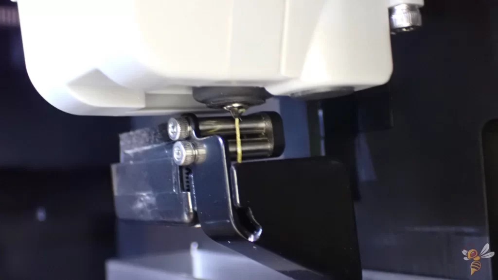 Close-up of the automatic nozzle cleaning device on the Qidi Tech Q1 Pro.
