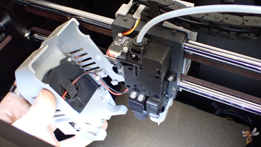 Photo of the open extruder of the Qidi Tech Q1 Pro.